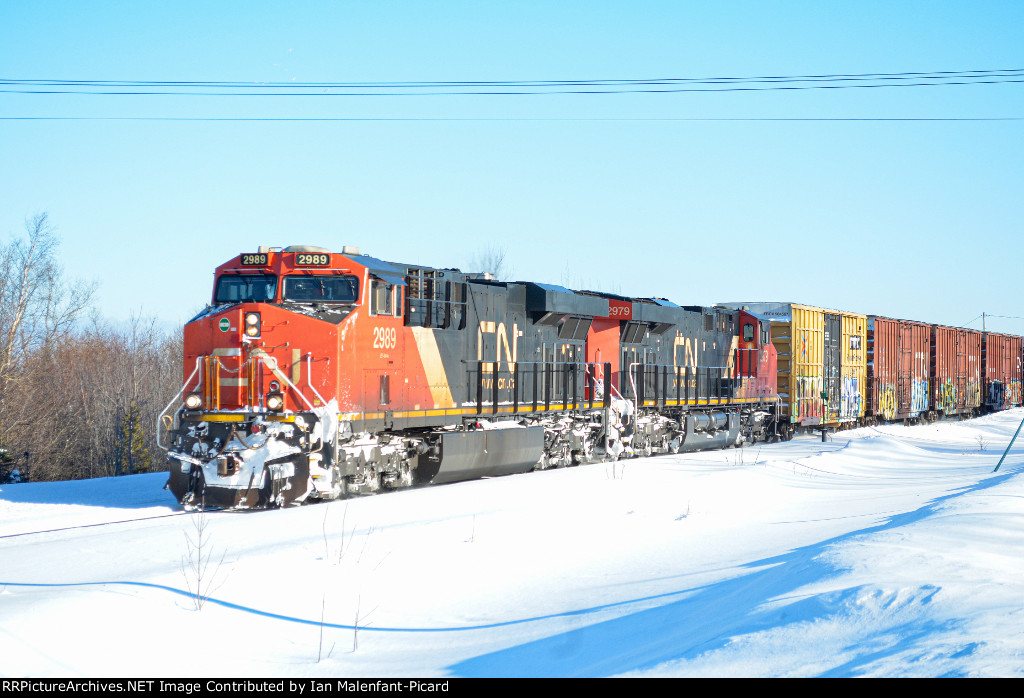 CN 2989 leads 403 next to St Jean Baptiste Street